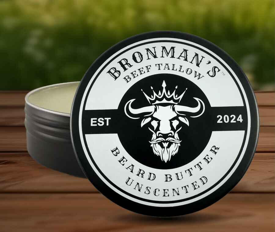 Bronman's Beard Butter unscented on a background of cows at pasture - contains New Zealand Beef Tallow Bronman's Beard Butter unscented on a background of cows at pasture - contains New Zealand Beef Tallow